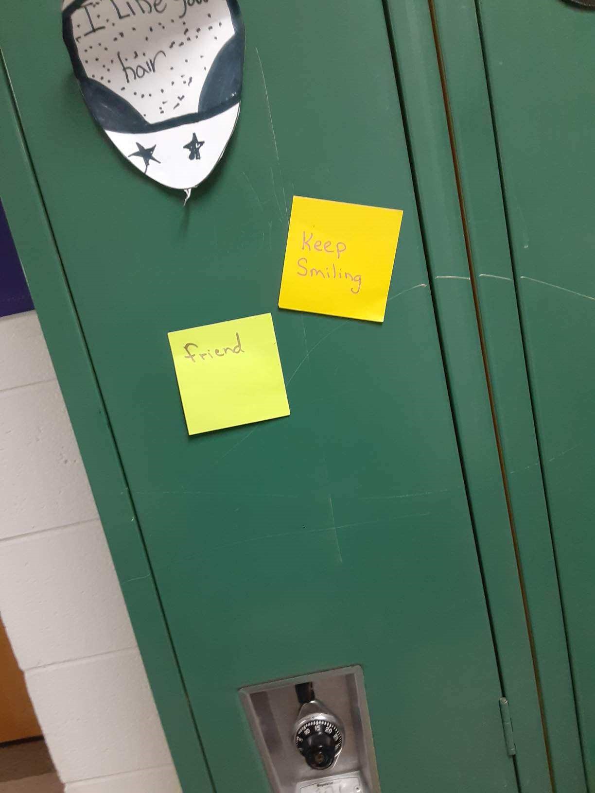 Post-it notes left on a locker.